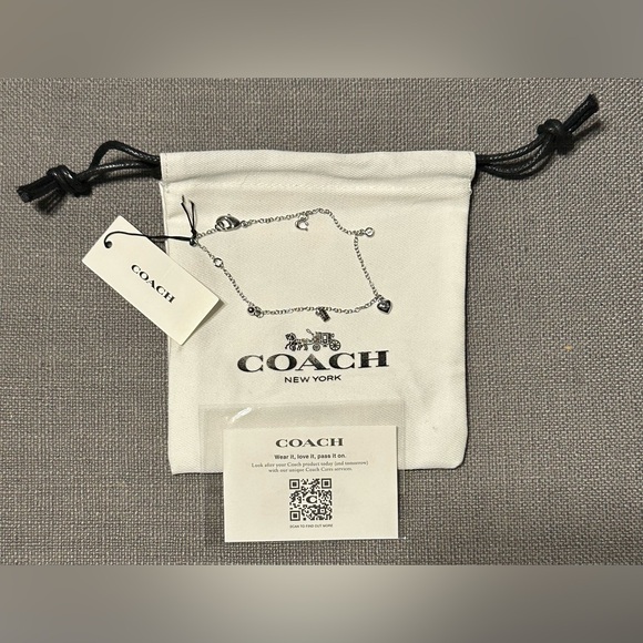 Coach New NWT silver tone chain charm bracelet featuring multiple charms - Picture 2 of 5